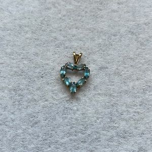 10kt yellow gold pendant with aquamarine stones